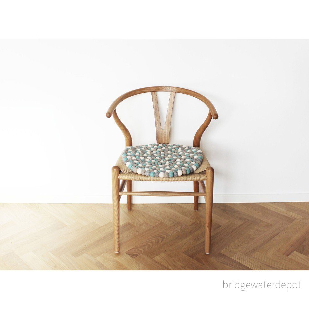 Světle modrý kuličkový vlněný podsedák Wooldot Ball Chair Pad, ⌀ 39 cm v:1341041