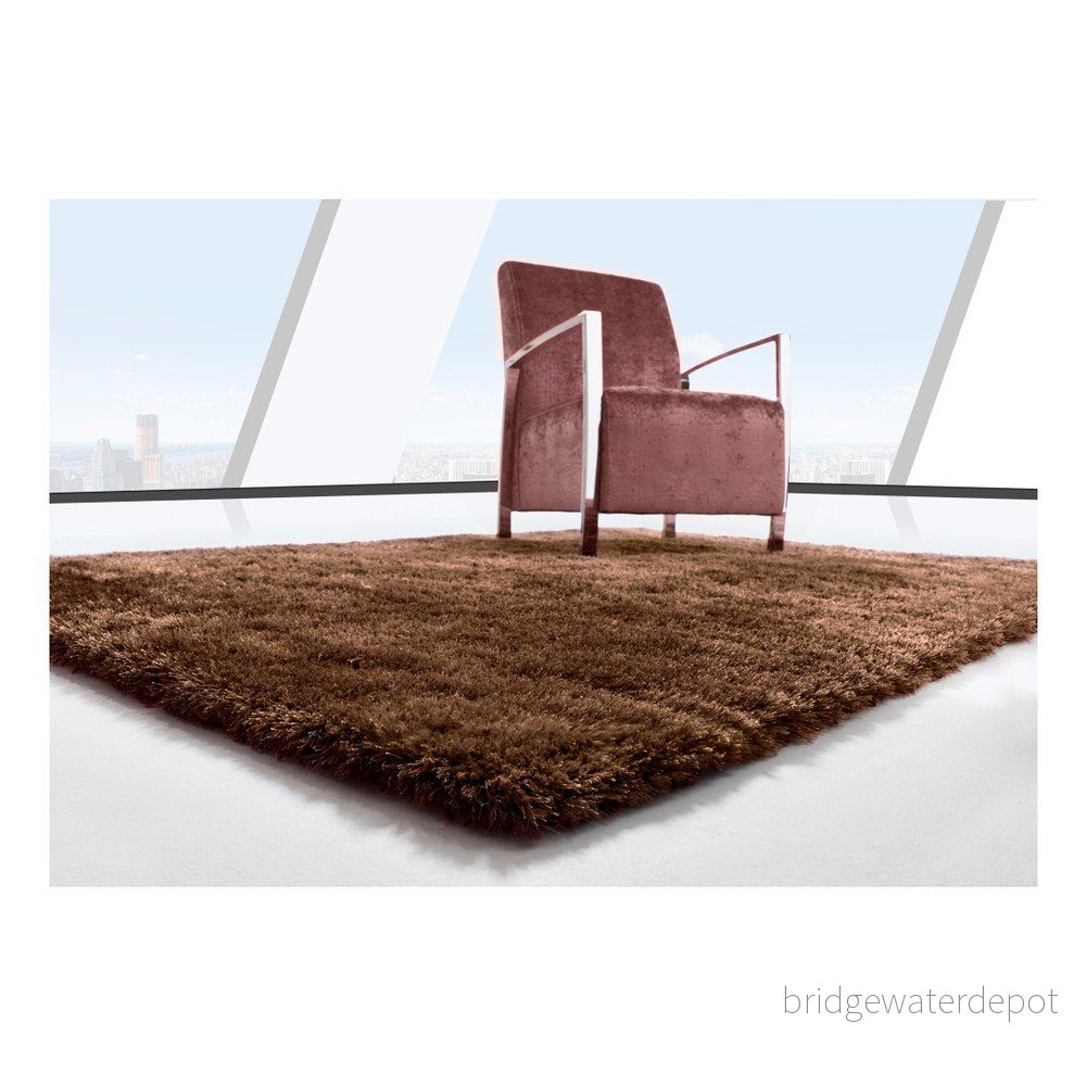 Tmavě hnědý koberec Universal Stela Brown, 60 x 110 cm v:1207418